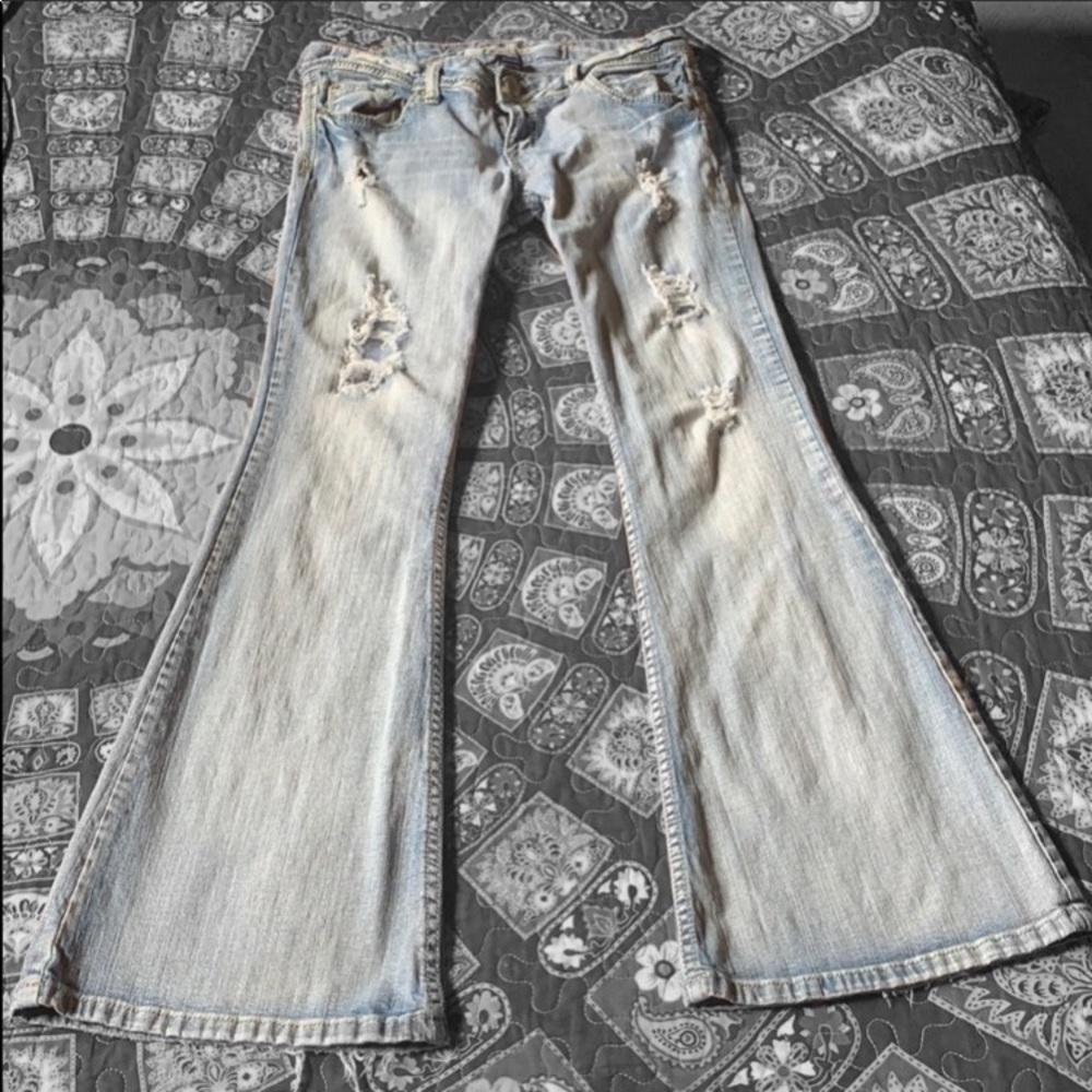 Distressed vintage flare amethyst jeans